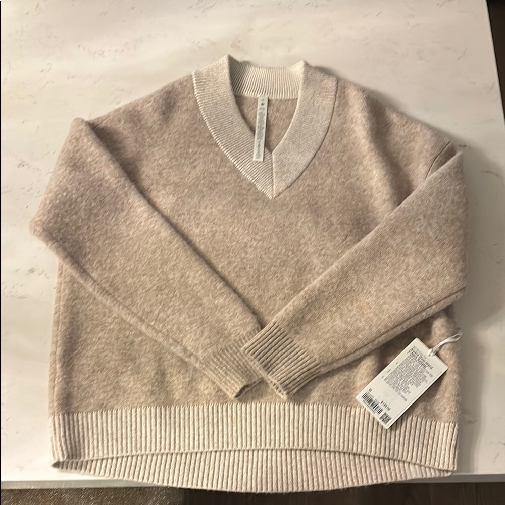 lululemon athletica Women's V-Neck Sweater in Light Beige